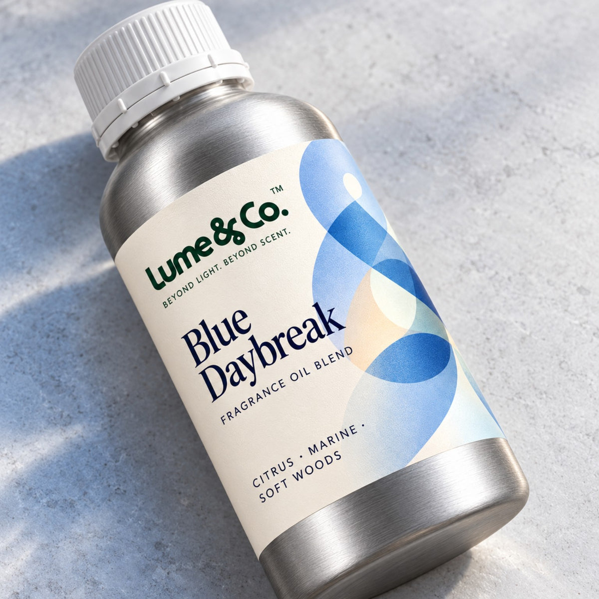 Blue Daybreak fragrance oil blend aluminum bottle close-up showing citrus marine and soft woods label