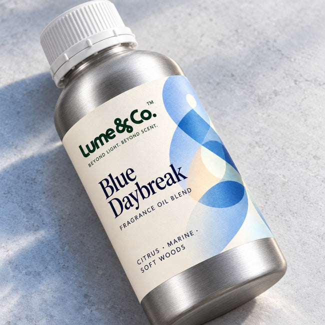 Blue Daybreak fragrance oil blend aluminum bottle close-up showing citrus marine and soft woods label