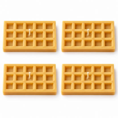 Four illustrative waffle wax candles with fifteen recessed squares each