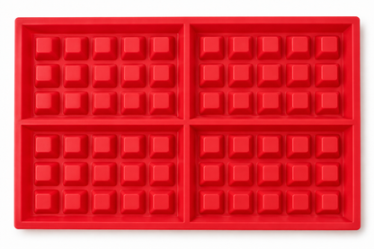 Overhead view of four rectangular waffle mould cavities, each with fifteen raised blocks