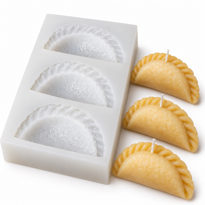 Angled close-up of gujiya mould texture and crimped edges beside example wax candles
