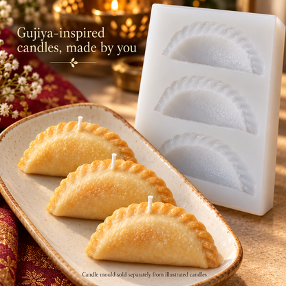 Realistic gujiya-shaped wax candle examples with cotton wicks beside the silicone mould