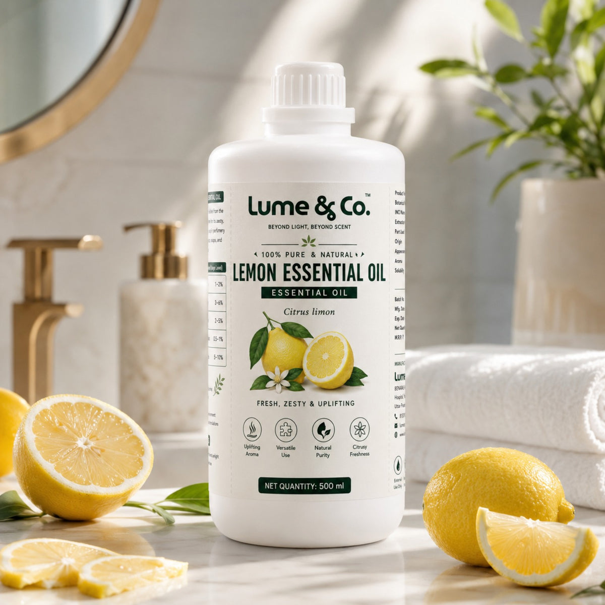 Lemon essential oil 500 ml bottle styled with fresh lemons in a bright bathroom setting