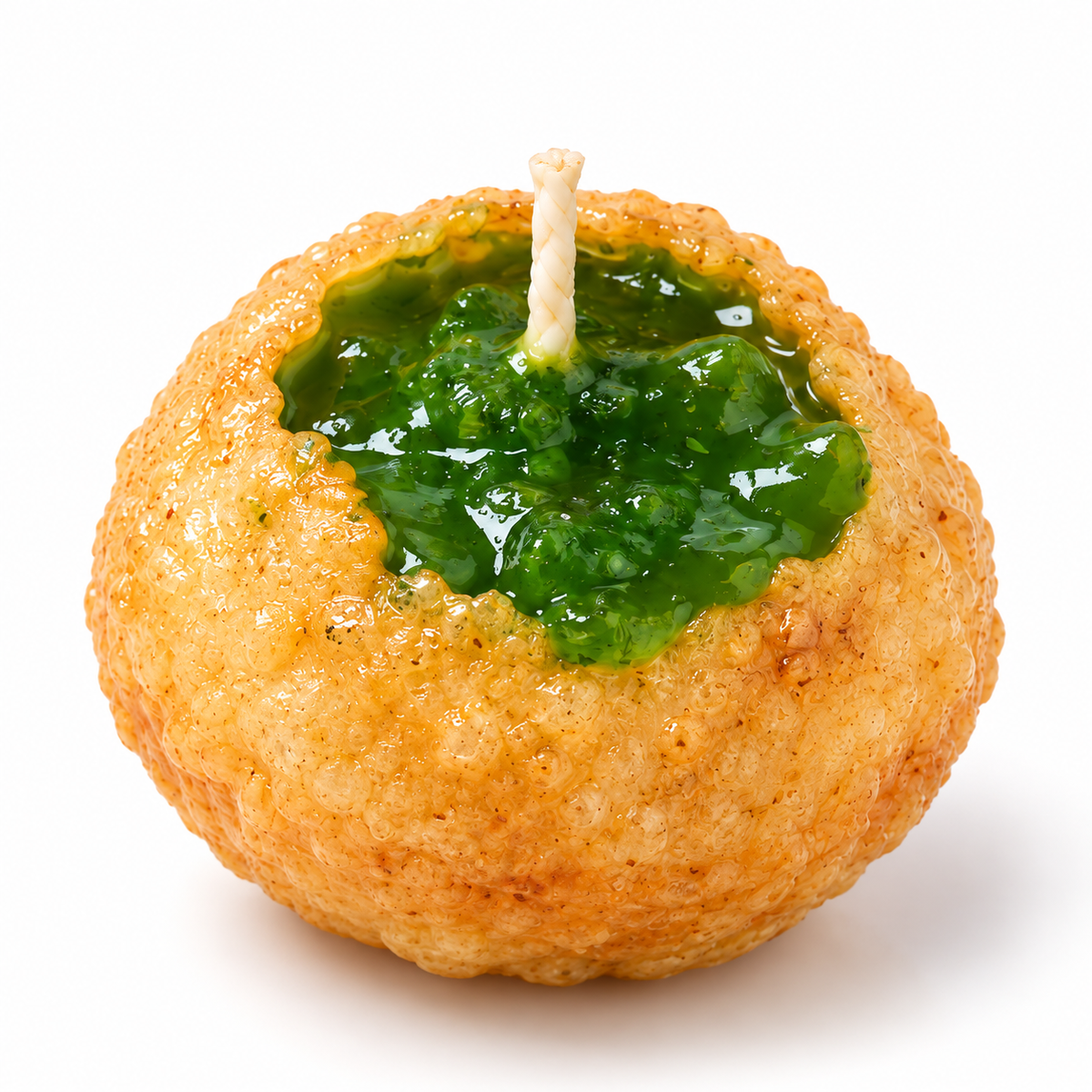 Green gel wax mint chutney close-up on a realistic handmade Pani Puri candle by Lume & Co.