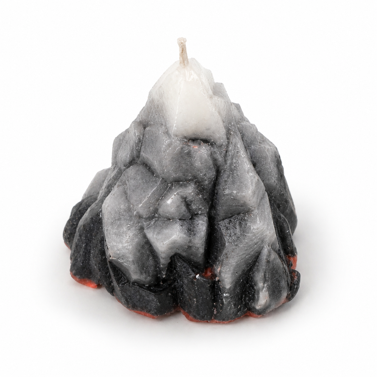 Textured black and gray candle on a white background