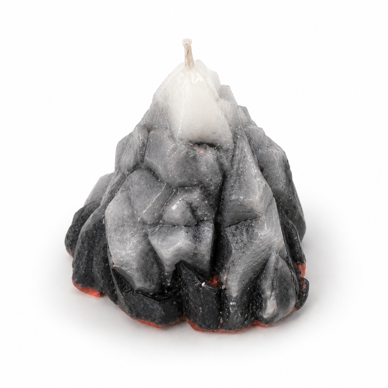 Textured black and gray candle on a white background