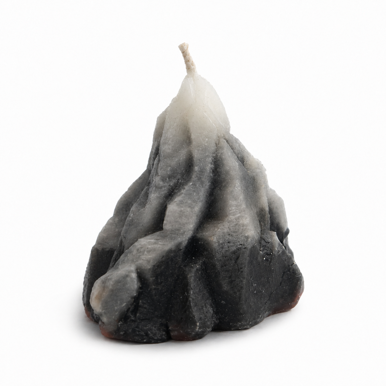 Textured candle with a gradient from gray to white on a white background