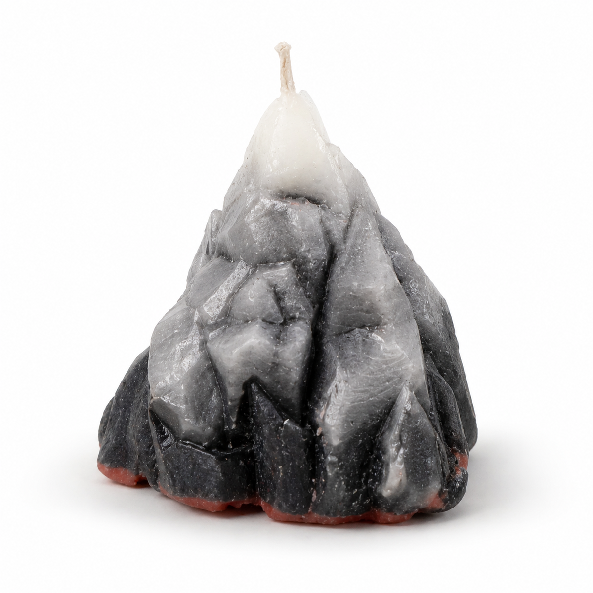 Candle shaped like a mountain on a white background